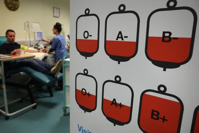 Blood donor Alan Caplan giving blood at the Glasgow Donor Centre as the Scottish National Blood Transfusion Service launches a festive appeal for blood donors. Pic: Andrew Milligan/PA Wire