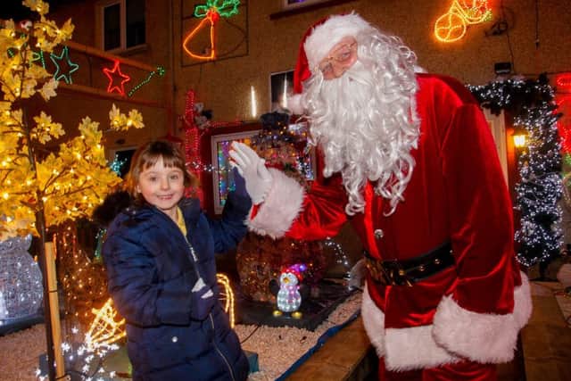 The grotto of Santa Davie Brown of Bonnyrigg who has been lighting up the town for over 10 years. Pic: P1 pupil Brook Louden from  local Hawthornden Primary