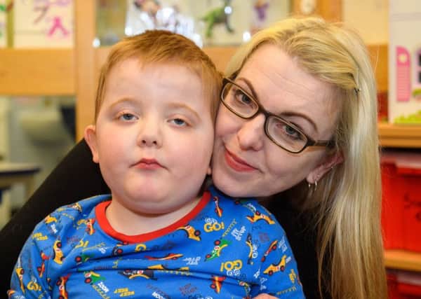 Karen Gray with her son Murray, who suffers from a rare form of epilepsy (Picture: Ian Georgeson)