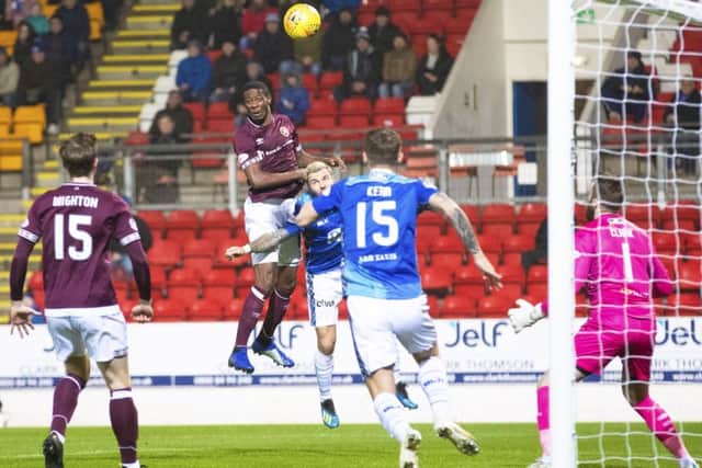 Arnaud Djoum headed Hearts into a sixth-minute lead