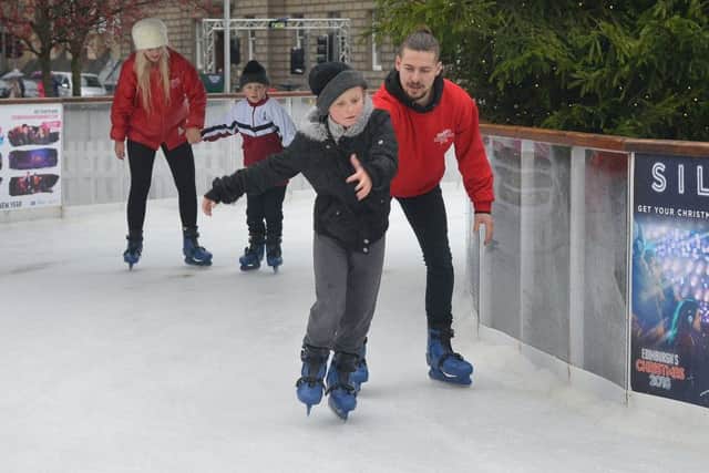 Matej Durec and Loransa Lina Lapina help Australians Tom and Jack Hall.