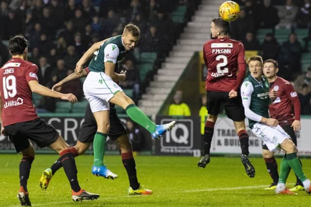 Hibs defender Ryan Porteous heads home to make it 2-2