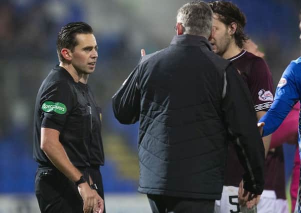 Hearts manager Craig Levein complains to referee Andrew Dallas at full-time