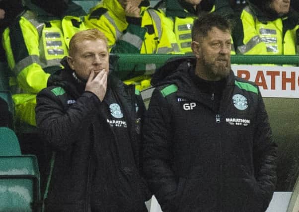 A frustrated Neil Lennon and Garry Parker look on at Easter Road