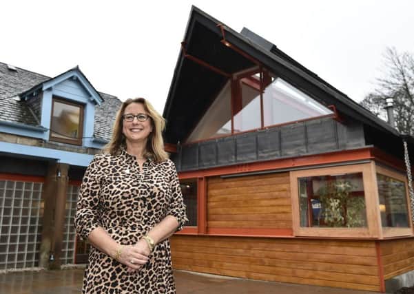 Maggie's fundraiser  Lisa Stevenson in front of the new extension, designed by Edinburgh architect Richard Murphy
. Picture: Neil Hanna