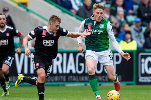 Vykintas Slivka battles with former Easter Road midfielder Scott Martin during the last meeting between Hibs and Hamilton. Picture: SNS Group