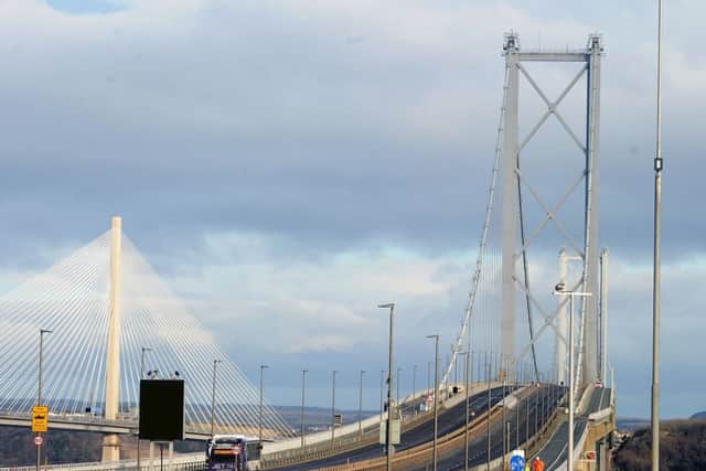 The Forth Road Bridge has closed to double-decker buses due to high winds.