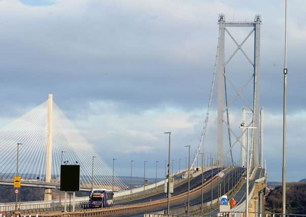 The Forth Road Bridge has closed to double-decker buses due to high winds.
