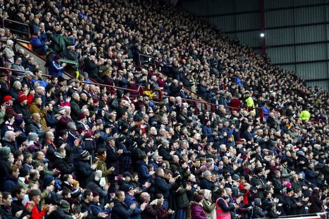 Hearts fans pictured at Tynecastle backing their team. Picture: SNS Group