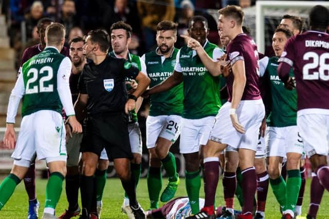 Hearts and Hibs players clash at Tynecastle Park in the recent Edinburgh derby