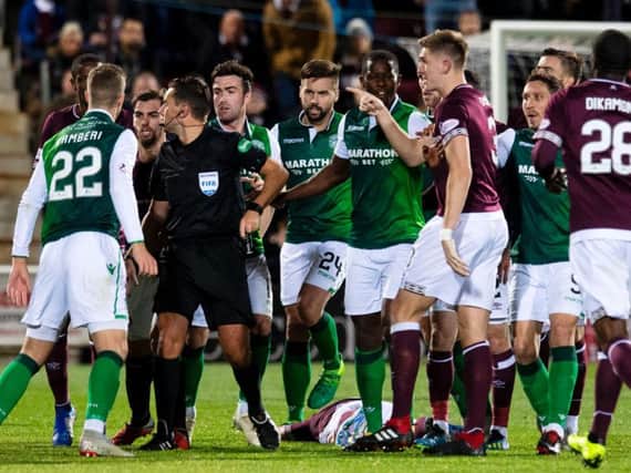 Hearts and Hibs players clash at Tynecastle Park in the recent Edinburgh derby