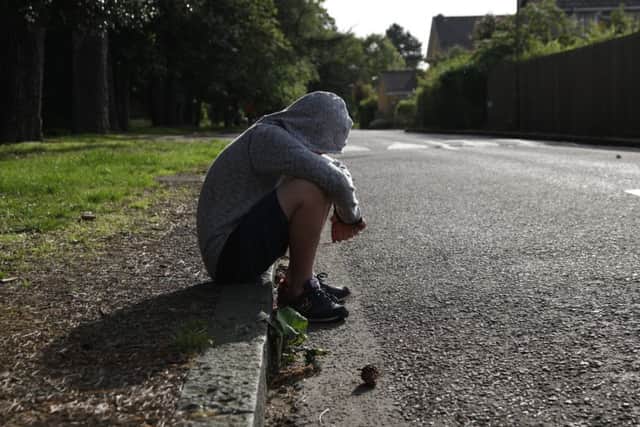 Bullied children may become withdrawn or reluctant to go to school