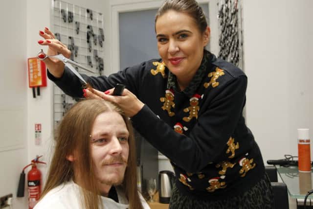 Toni & Guy hairdressers who offered free haircuts for the homeless -
Gillian Solley, manager, and Matt Harcus