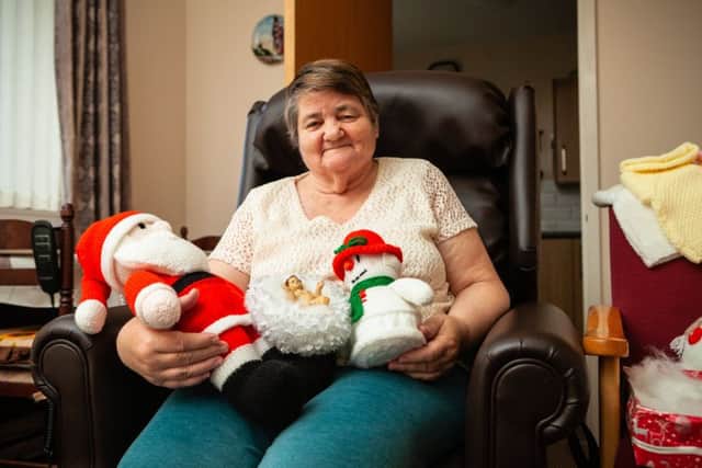 Irene Bishop, who lives at Bields Whitehill Lodge in Dalkeith, has completed over 15 intricately designed knits, including penguins, logs, snowmen and Santa Clauses.
