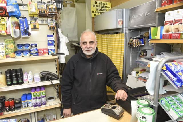 Mr Ulfatullah Malik, who owns Sweet Service convenience store on the corner of Lyndedoch Place. Pic: Greg Macvean