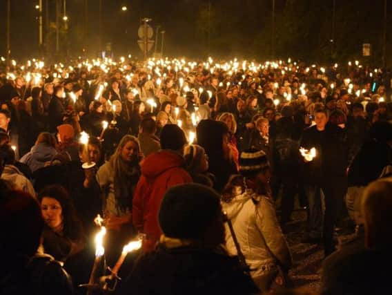 This year's Torchlight procession cuts through the heart of the Old Town (Photo: Shutterstock)