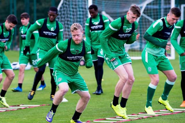 Daryl Horgan, centre, pictured in training for Hibs. Pic: SNS
