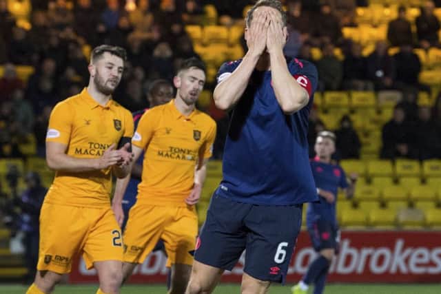 Hearts captain Christophe Berra says the 5-0 defeat by Livingston brought them back down to earth. Pic: SNS