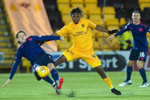 Peter Haring and his Hearts team-mates had a chastening evening against Dolly Menga and Livingston. Pic: SNS