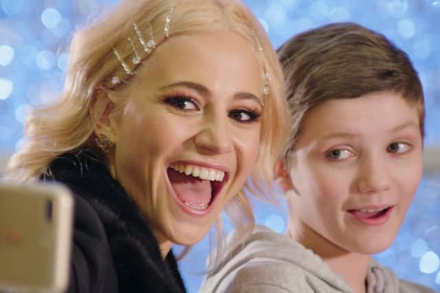 Pixie Lott poses for a selfie with 11-year-old Sophie