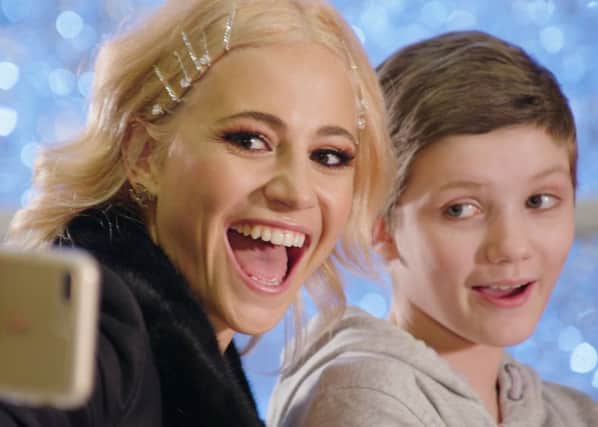 Pixie Lott poses for a selfie with 11-year-old Sophie
