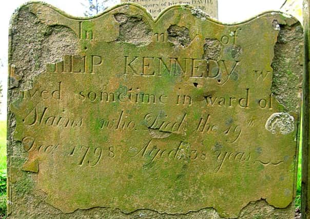 The gravestone of smuggler Philip Kennedy who was killed after being struck by an exciseman's sword. PIC. www.geograph.co.uk