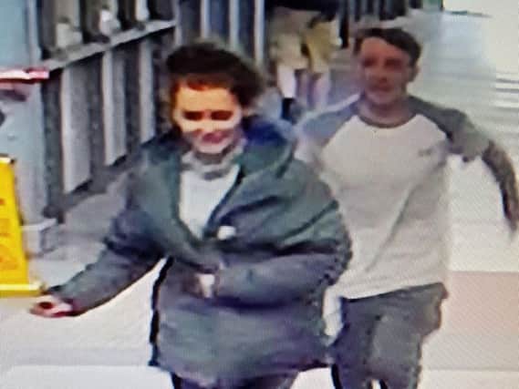 British Transport Police have released a CCTV image showing two people they would like to speak to in connection with the incident. Pic: British Transport Police