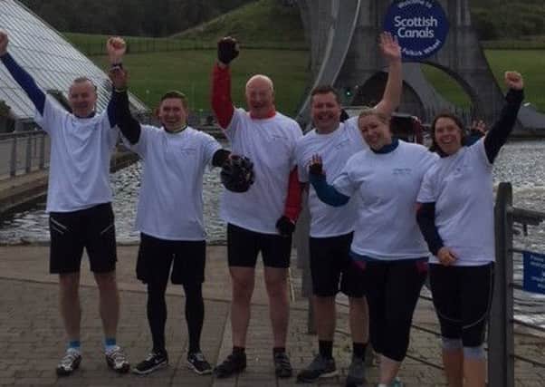The Gallagher team at the Falkirk Wheel finishing line