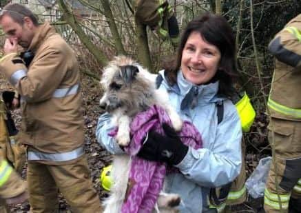 May Watson with her dog, Ethel, which was rescued by firefighters after becoming trapped on Corstorphine Hill