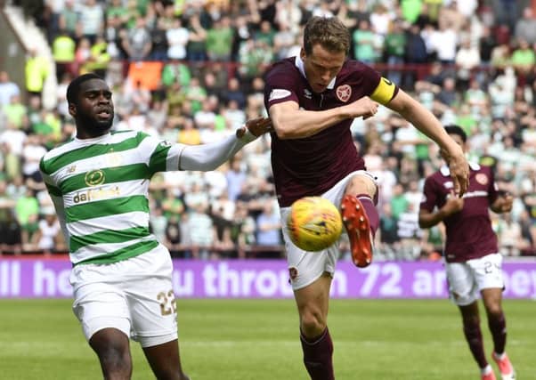 Christophe Berra vies with Odsonne Edouard during a previous clash at Tynecastle between Hearts and Celtic. Picture: SNS Group