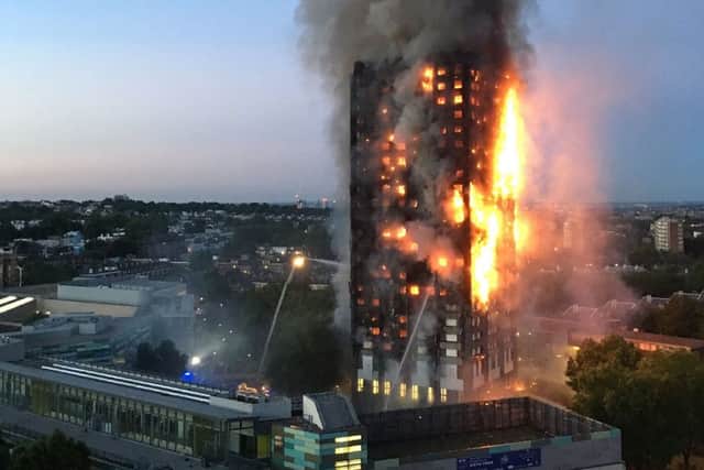 Flames and smoke coming from a 27-storey block of flats after a fire broke out in west London.
 Pic: handout from local resident Natalie Oxford/ Getty