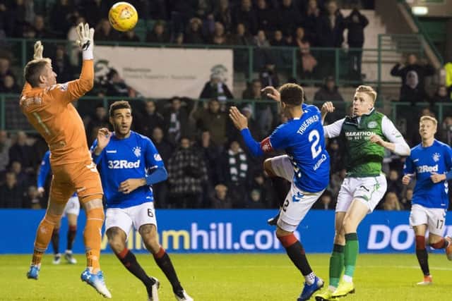 Oli Shaw fires a great chance over the bar for Hibs