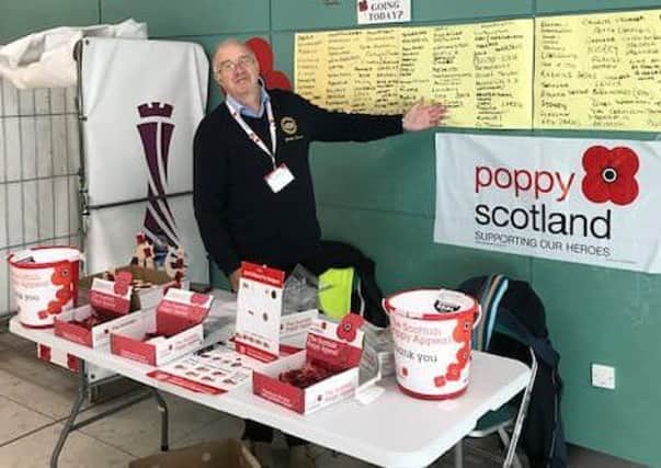Gordon Guthrie at the Poppyscotland stand in Edinburgh Airport