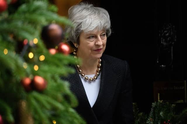 Will Theresa May have much to celebrate this Christmas? Picture: Getty