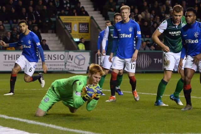 Adam Bogdan made some stunning saves and helped Hibs to keep out 27 shots on goal by Rangers. Picture: SNS