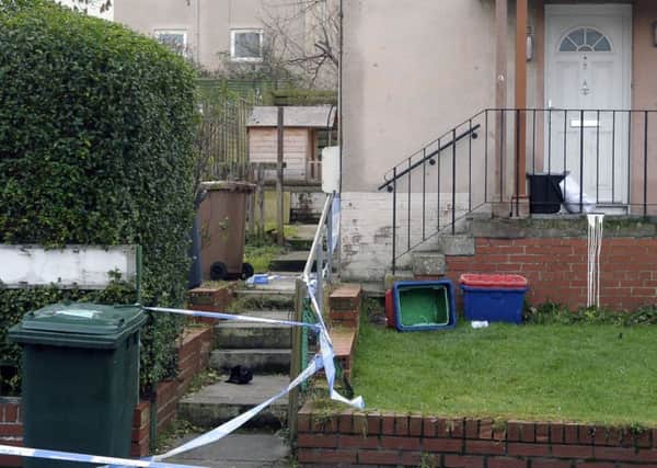 A property has been taped off at Claverhouse Drive. Picture: Neil Hanna