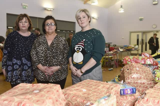 Livingston Station Community Centre  organiser Joanne Baxter flanked by Fiona Hyslop (left),  Cabinet Secretary for Culture, Tourism and External Affairs and local MP Hannah Bardell  (right). Picture: Neil Hanna