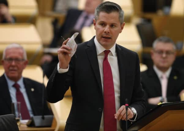 Derek Mackay delivers his draft Budget at the Scottish Parliament