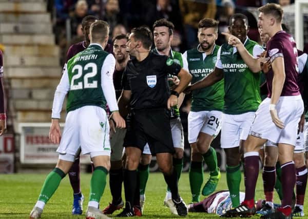 Ben Garuccio was in the thixk of it as Hibs' Flo Kamberi was sent off at Tynecastle