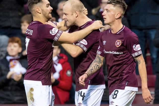 Steven Naismith celebrates putting Hearts ahead against Hamilton