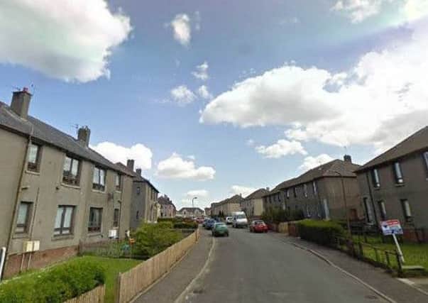 The robbery happened in a lane off Scott Place in Fauldhouse