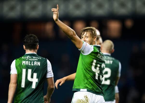 Sean Mackie, who set up the equaliser, salutes the Hibs fans at Ibrox