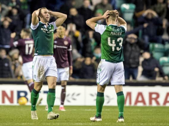 Steven Whittaker and Sean Mackie show their dejection at Easter Road. Pic: SNS