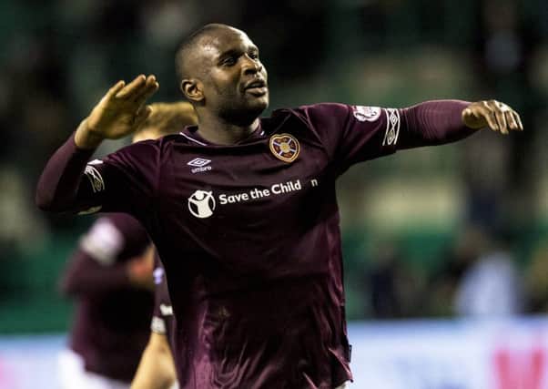 Clevid Dikamona salutes the Hearts fans after the 1-0 win over Hibs. Pic: SNS
