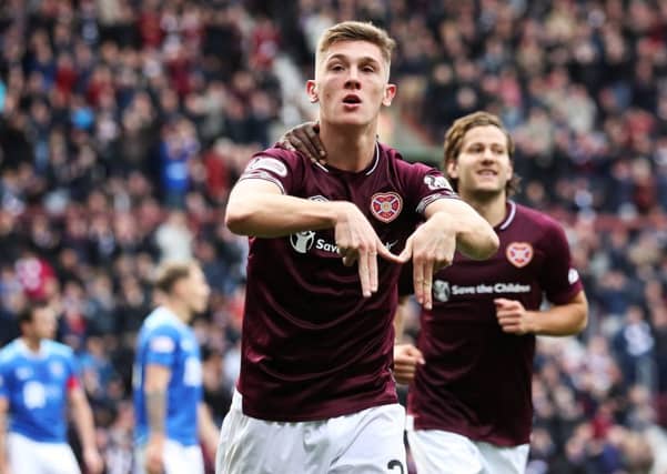 Jimmy Dunne celebrates scoring for Hearts against St Johnstone. The Burnley defender looks set to join Sunderland on loan. Picture: Getty Images