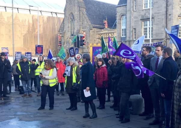College lecturers striking over pay outside the Scottish Parliament in Edinburgh. Pic: Tom Eden/PA Wire