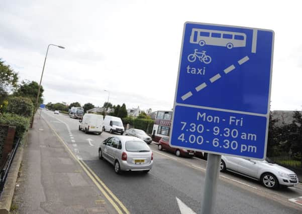 Drivers in bus lanes at peak hours attract Christine Grahame's ire. Picture: Greg Macvean