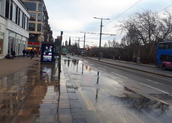 Water can be seen flowing down Princes Street. Picture: Contributed