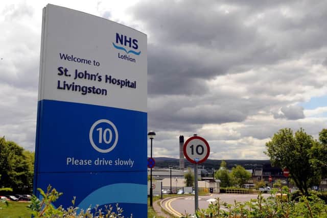 The victim was taken to St John's Hospital by the Scottish Ambulance Service. Picture: Lisa Ferguson
