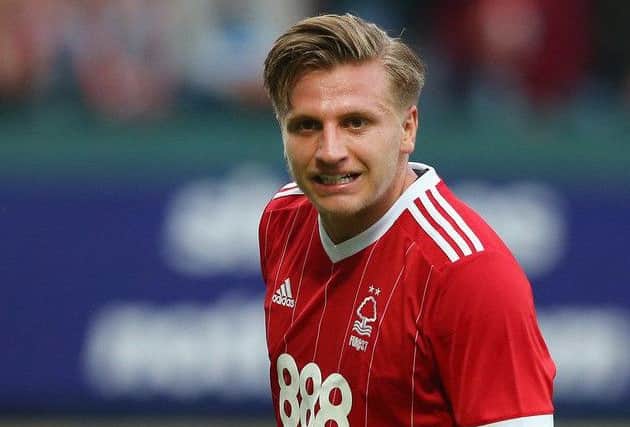 There have been "multiple enquiries" about Nottingham Forest's former Hibs striker Jason Cummings, according to the Peterborough owner. Picture: Getty Images